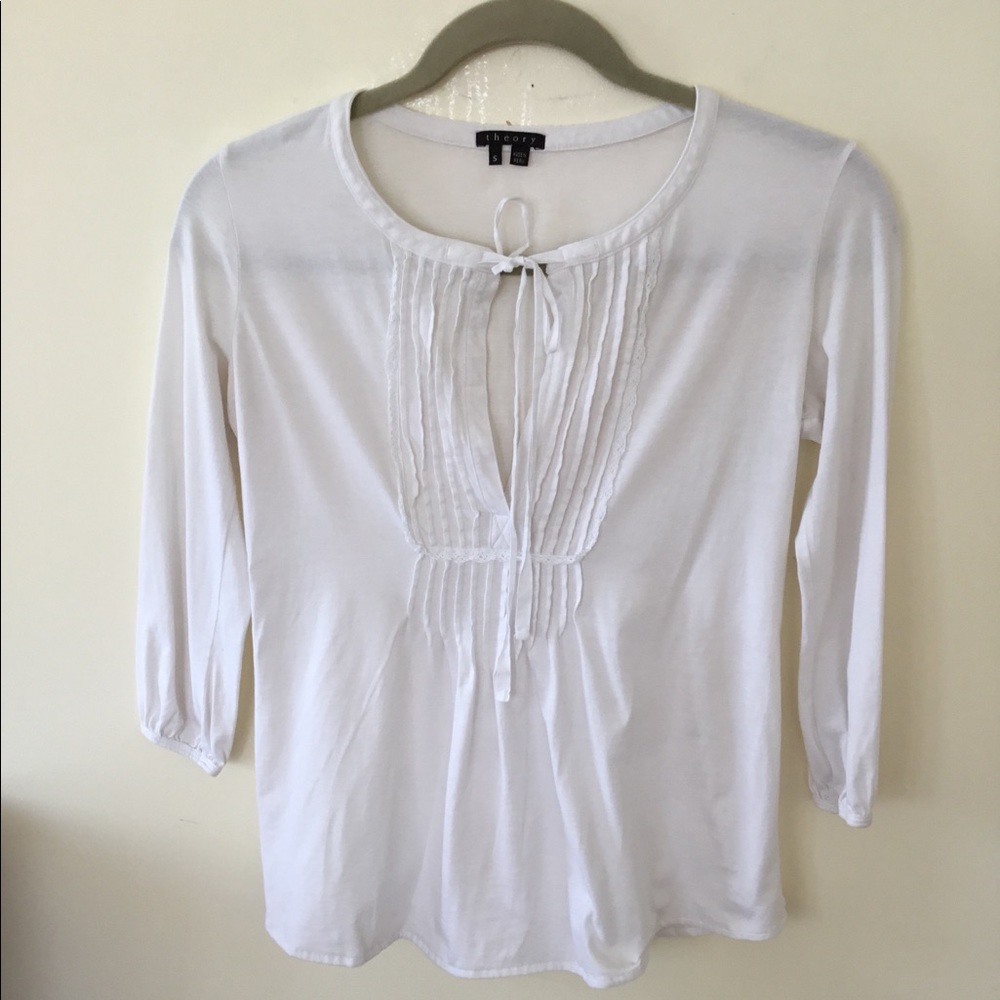 Theory white pull over blouse with tie in front. S
